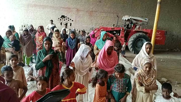 Photograph 3 of 13 sent from the ministry in Pakistan: children and families gathered outdoors