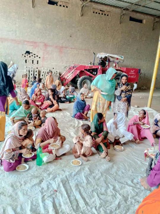Photograph 9 of 13 sent from the ministry in Pakistan: children and families gathered outdoors